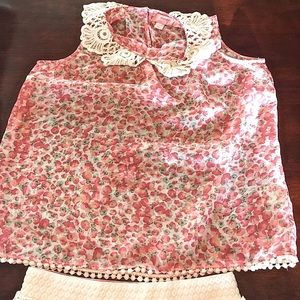 Beautiful semi sheer flowy floral top with crochet collar detail
